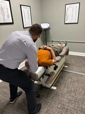 Chiropractor Chattanooga TN Davy Addison Adjusting Patient